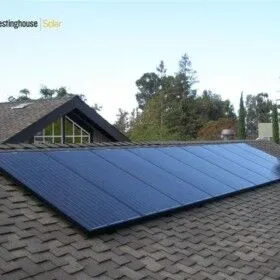 Solar panel array installed on residential roof for renewable energy.