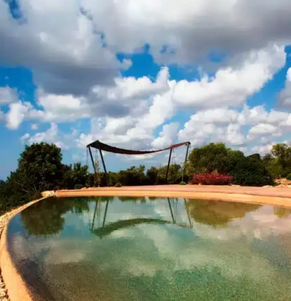 Beautiful inground pool with scenic views and outdoor furnishings in Long Island, perfect for outdoor relaxation. Inground pool with scenic landscape and outdoor furnishings in Long Island.