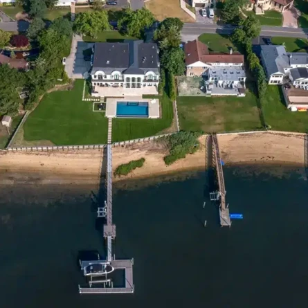Luxury waterfront home with pool and dock in Hewlett, Long Island.