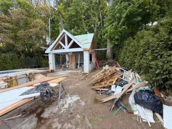 Construction site for pool and outdoor furnishings in progress on Long Island.