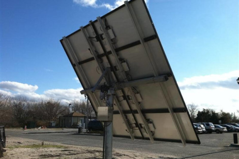 A solar panel installed outdoors on Long Island, capturing sunlight for renewable energy. Solar panel tilted towards the sky for energy collection in Long Island.