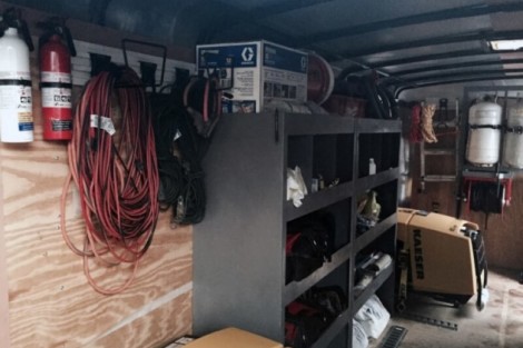 Garage storage with pool installation tools and outdoor furnishings for Long Island pools. Pool installation tools and outdoor furnishings in a garage setting.